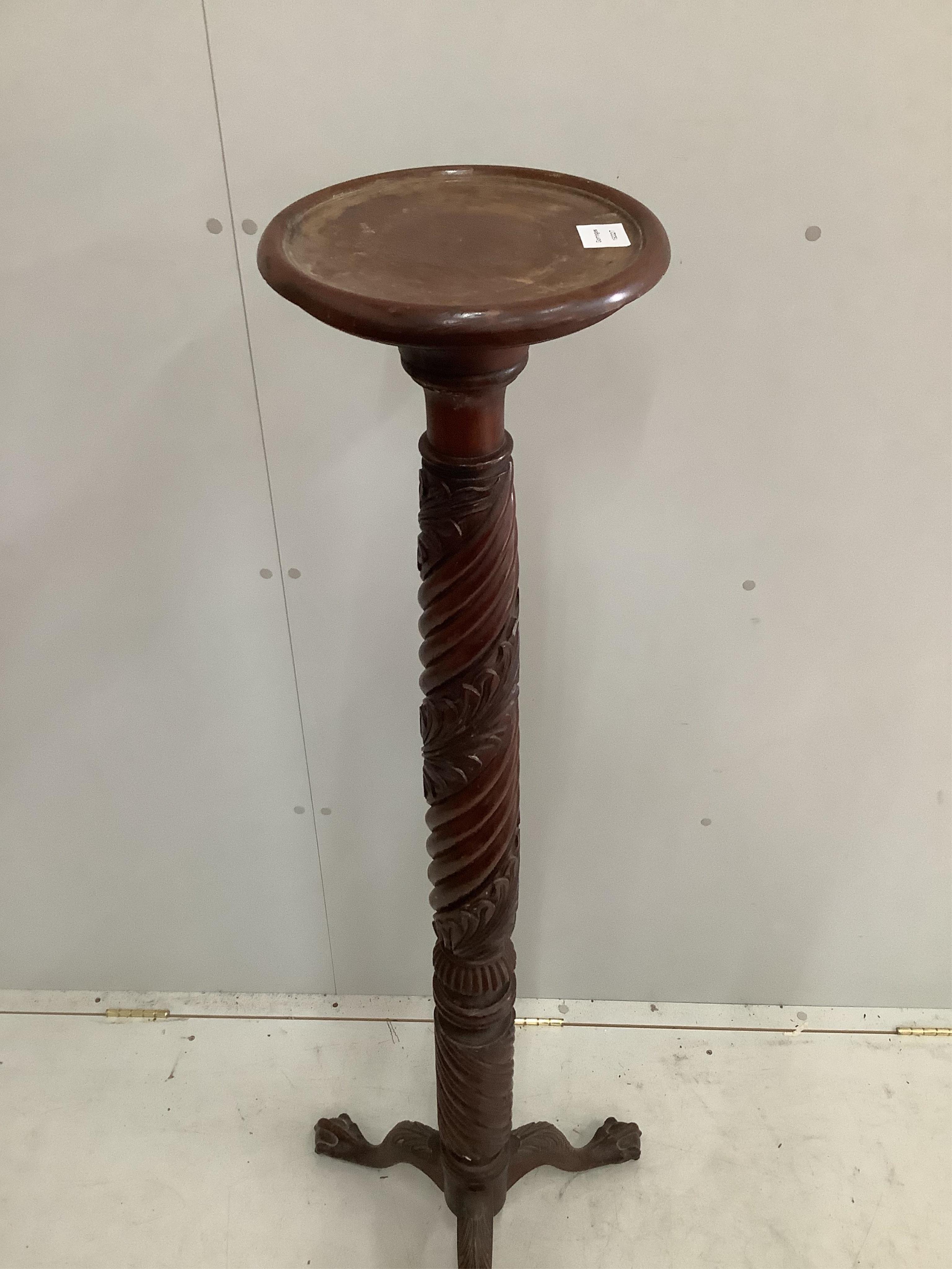 A mahogany bedpost torchere stand, height 146cm. Condition - fair